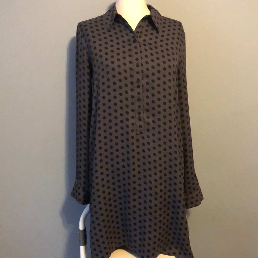 Dark gray dress with black polka dots.